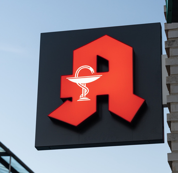 German Apotheke Pharmacy with a Big Logo Sign Pulsulin Apotheke